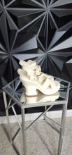 Load image into Gallery viewer, CIRCUS CREAM HEELS       SZ 7.5
