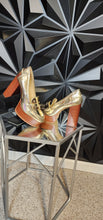 Load image into Gallery viewer, NEW MICHAEL KORS GOLD PLATFORM HEELS         SZ 10
