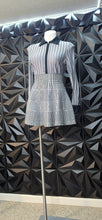 Load image into Gallery viewer, Houndstooth skirt   sz med/large fit
